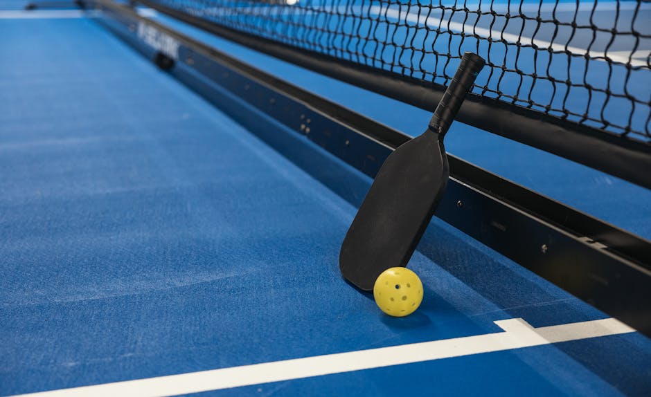 Pickleball scoreboard with paddle and ball